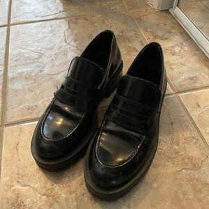 Black loafers